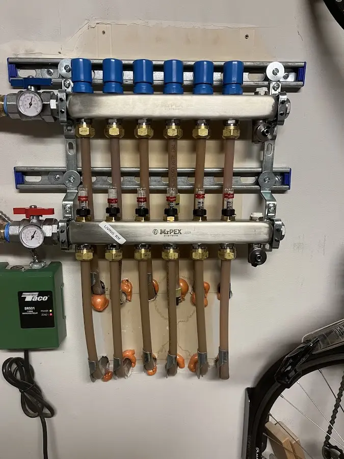 Plumber performing Water Heater Repair at a residential property in Rawlins